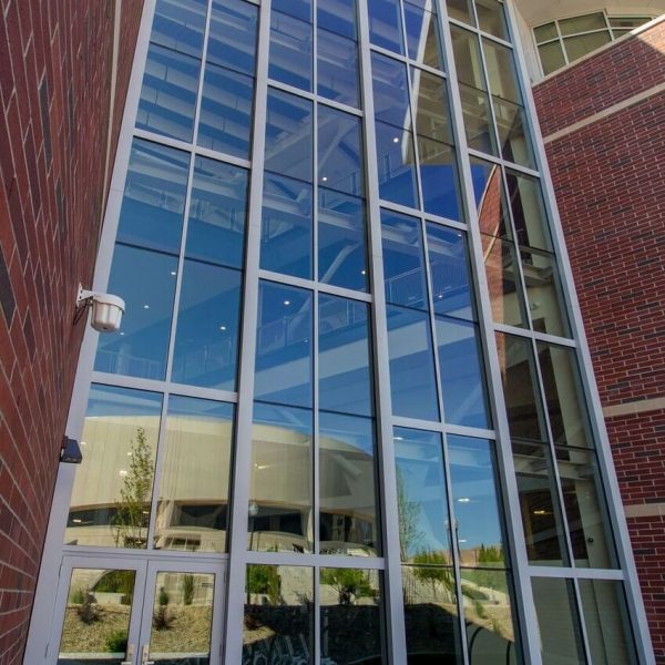 Capital Glass provides Reno, Carson City and the Northern Nevada area with the best in residential and commercial glass services. Our services include glass repair, window repair, automatic door installation, and frameless shower enclosures. EL Wiegand Building-2017 #06c